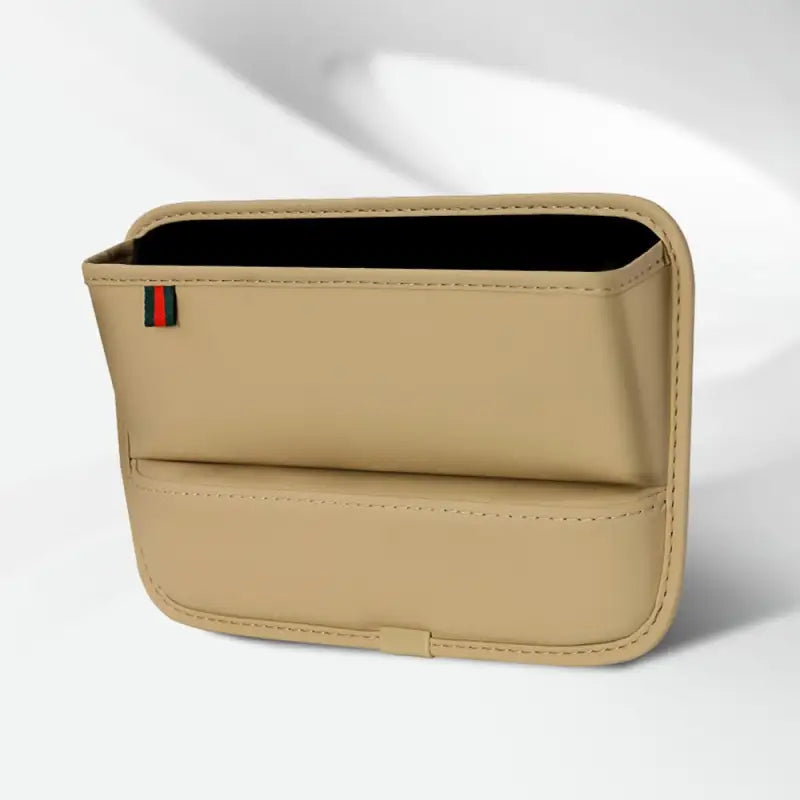 a tan leather wallet with a black card holder