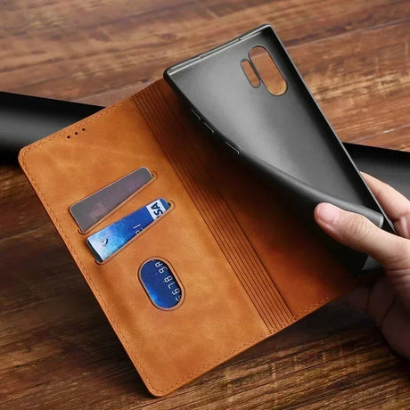 Leather wallet-style phone case with card slots and a detachable cover.