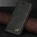 Leather wallet-style phone case with a metallic triangle emblem.