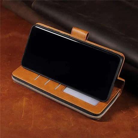 Leather wallet-style phone case with card slots and a black smartphone inserted.