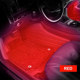 the interior of a car with red light