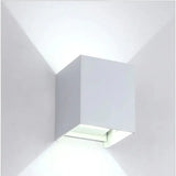 a white wall light with a square shape
