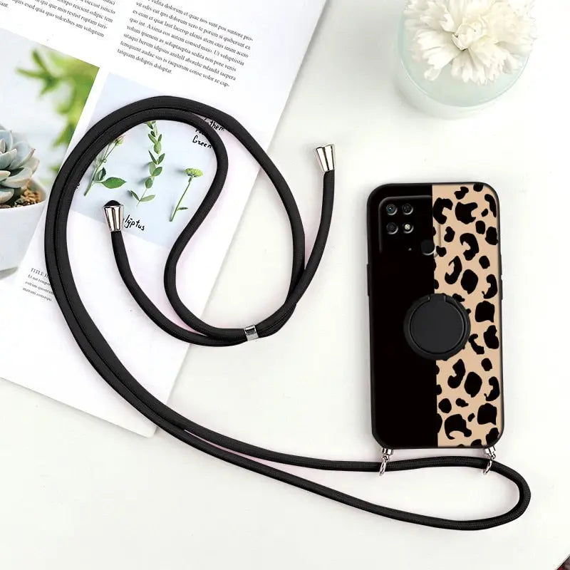 a black and white phone case with a black strap