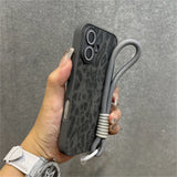 Leopard-print phone case with lanyard.