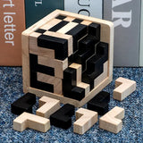 a wooden block toy with a black and white face