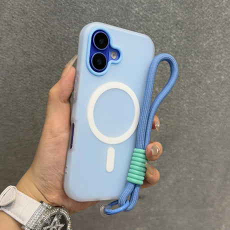Light blue iPhone case with a white magnetic ring, a matching wrist strap, and a clear protective bumper.