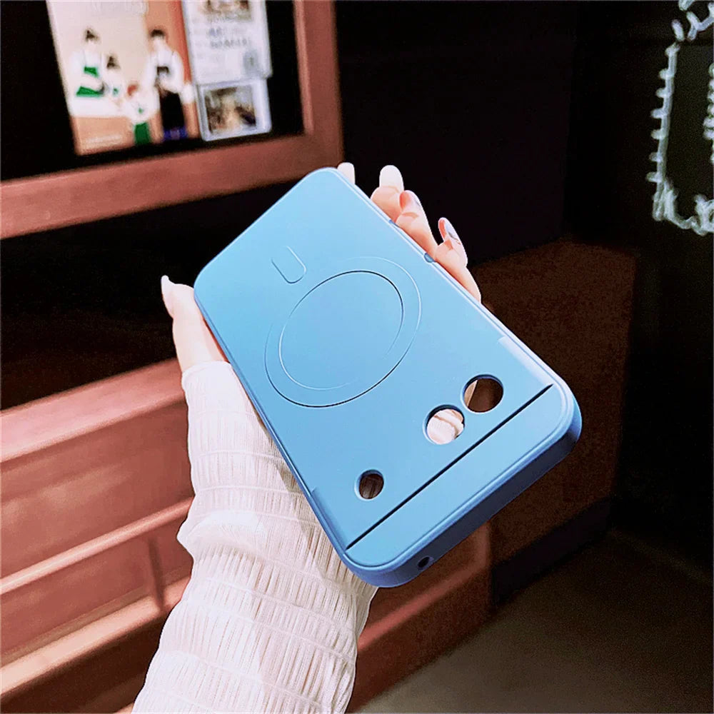 Light blue phone case shaped like a cartoon character with rounded ears.