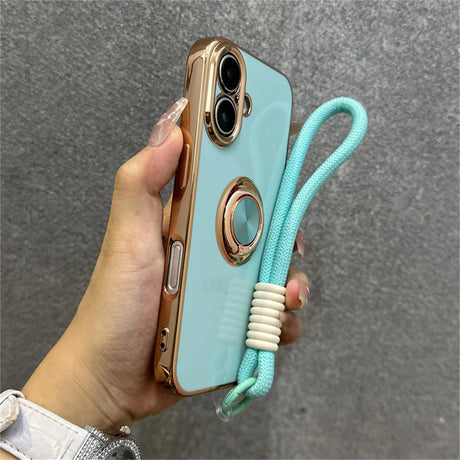 Light blue phone case with gold trim and ring holder.