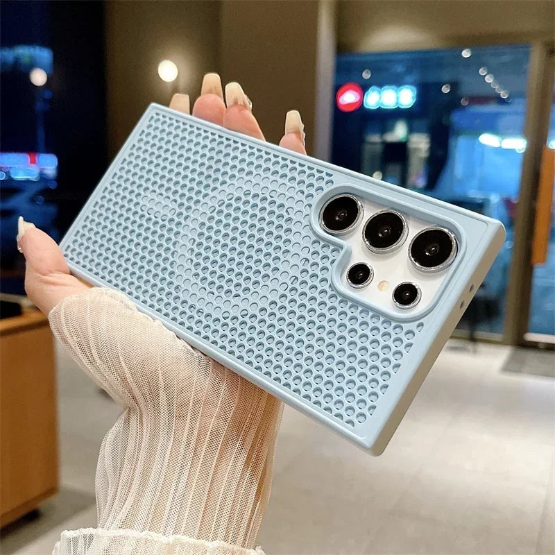 Light blue smartphone case with a perforated pattern and multiple camera cutouts.