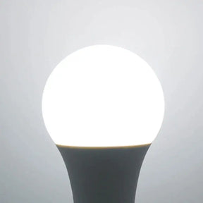 A light bulb with a white light on it