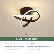 a light fixture with a white light on the ceiling