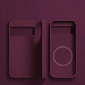 Light switch with two rectangular panels in a deep purple color.