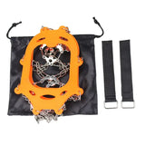 a black bag with a chain and a orange cara