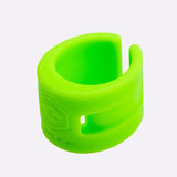 a green silicon ring with a white background