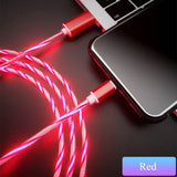 a red cable connected to a laptop