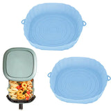 two blue plastic bowls with lids and lids