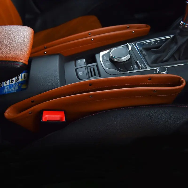 the interior of a car with a leather seat