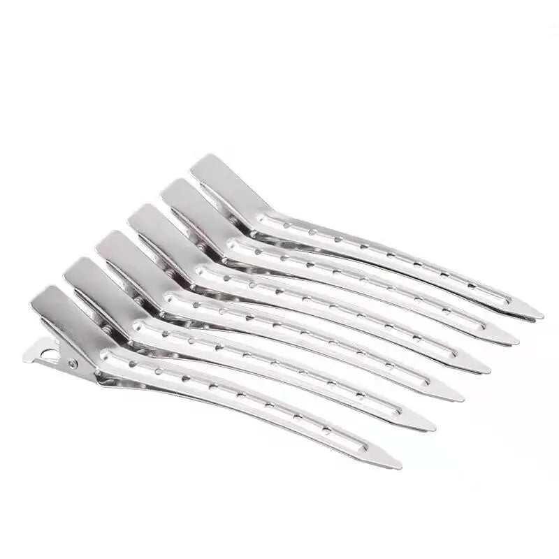 a set of five stainless hair clips