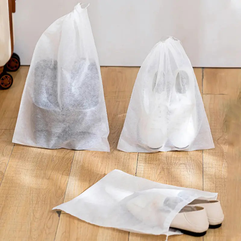 two bags of white paper on the floor