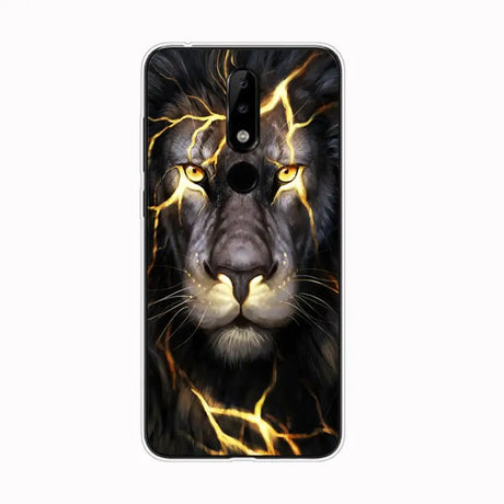 a close up of a cell phone with a lion on it