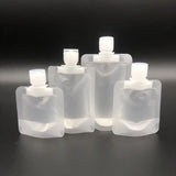 a set of six plastic bottles with a white cap