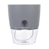 the glass cup with a grey lid