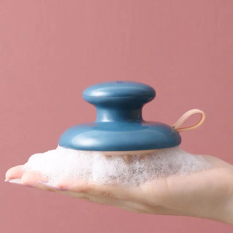 a hand holding a blue salt shaker