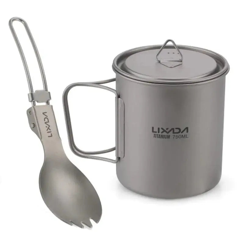 a close up of a stainless steel mug with a spoon