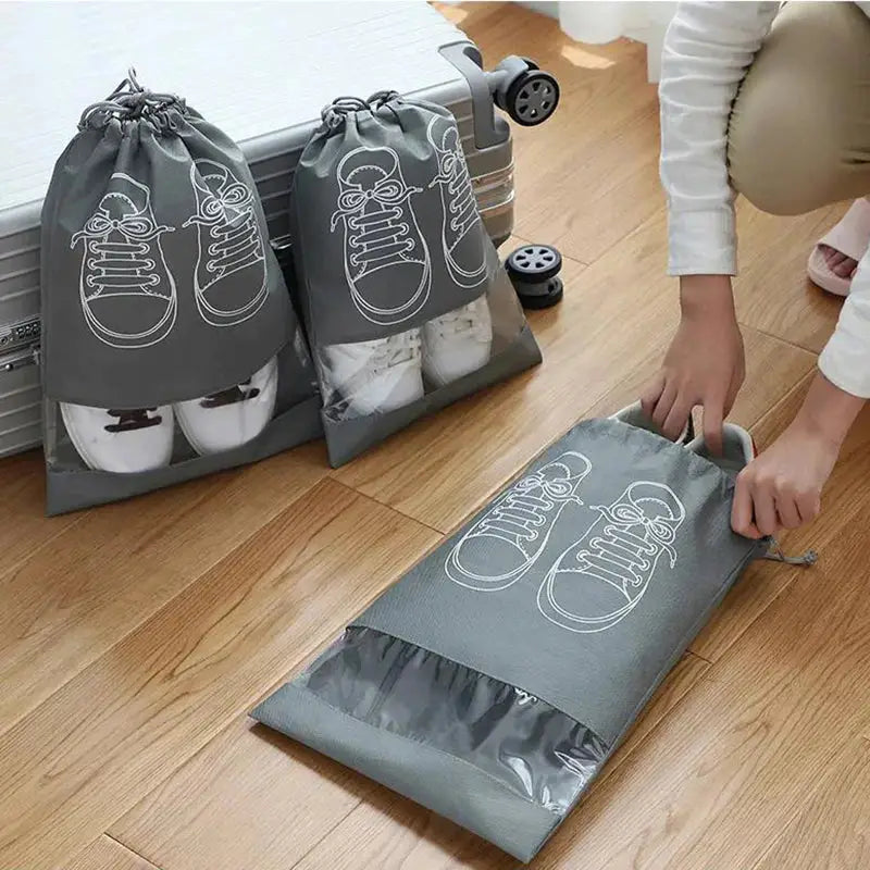 a person putting a bag with a shoe