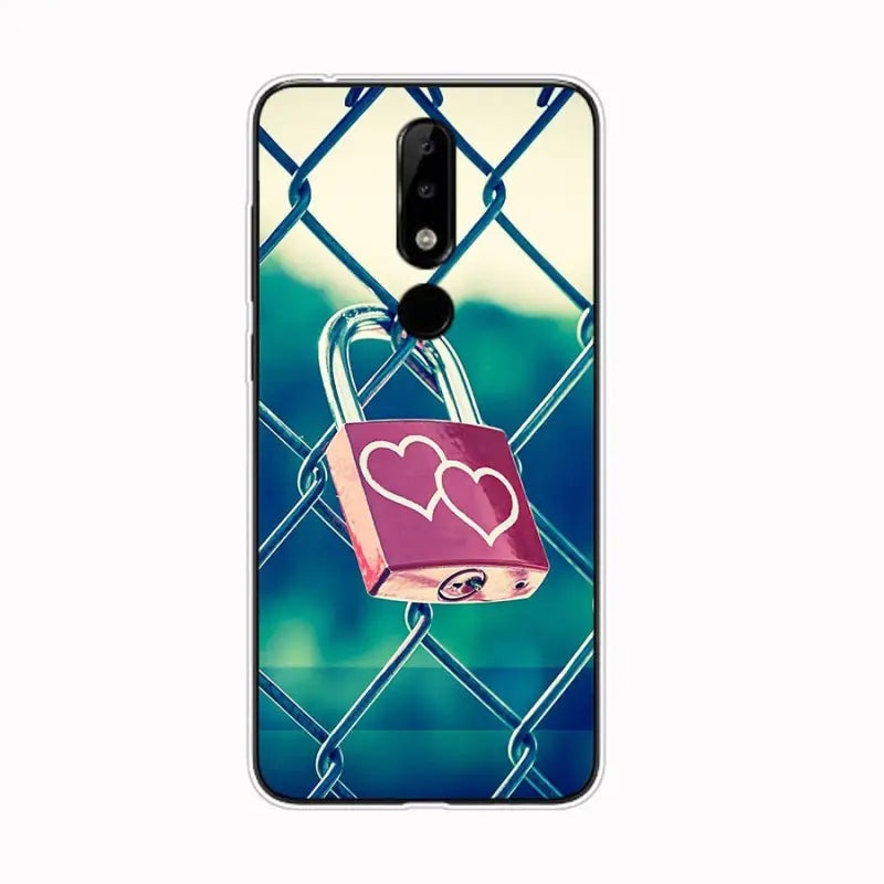 a lock and heart on a blue background with a chain