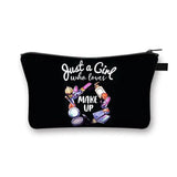 a black cosmetic bag with a cartoon character on it