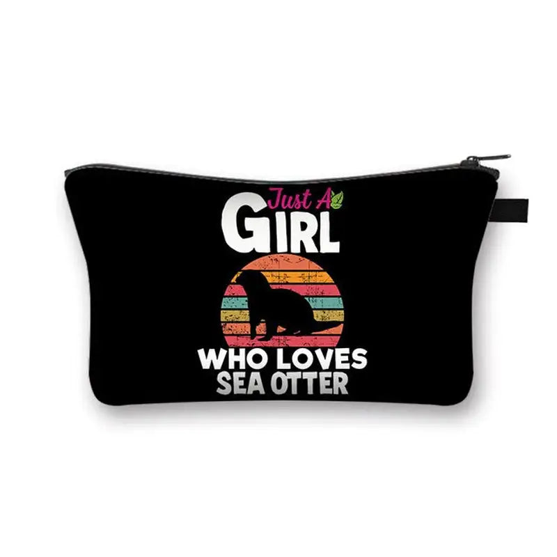 a black cosmetic bag with the words girl who loves sea otter