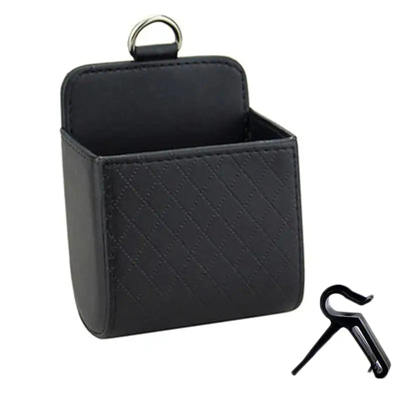 a black leather case with a key in it
