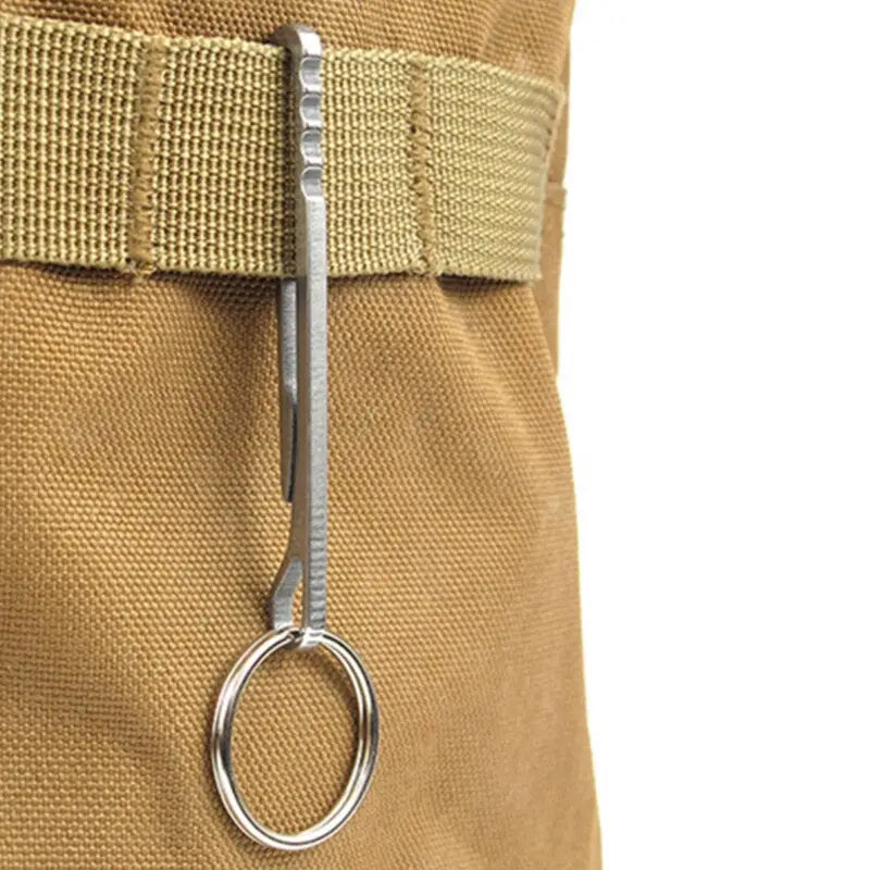 a small bag with a metal hook on it