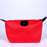 a red bag with black handles