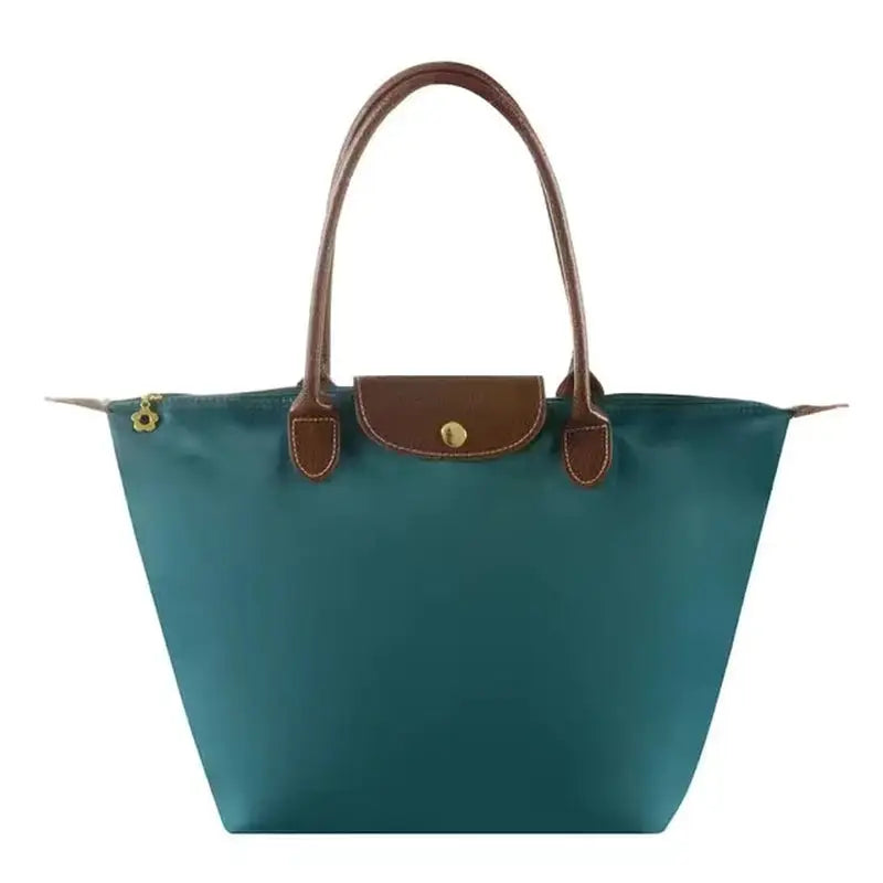 a green and brown tote bag