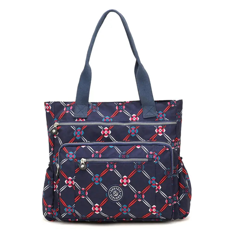 a close up of a blue and red bag with a pattern