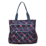 a close up of a blue and red bag with a pattern