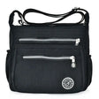 the black nylon bag with zippers and a zipper closure