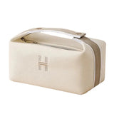 the cosmetic bag in beige