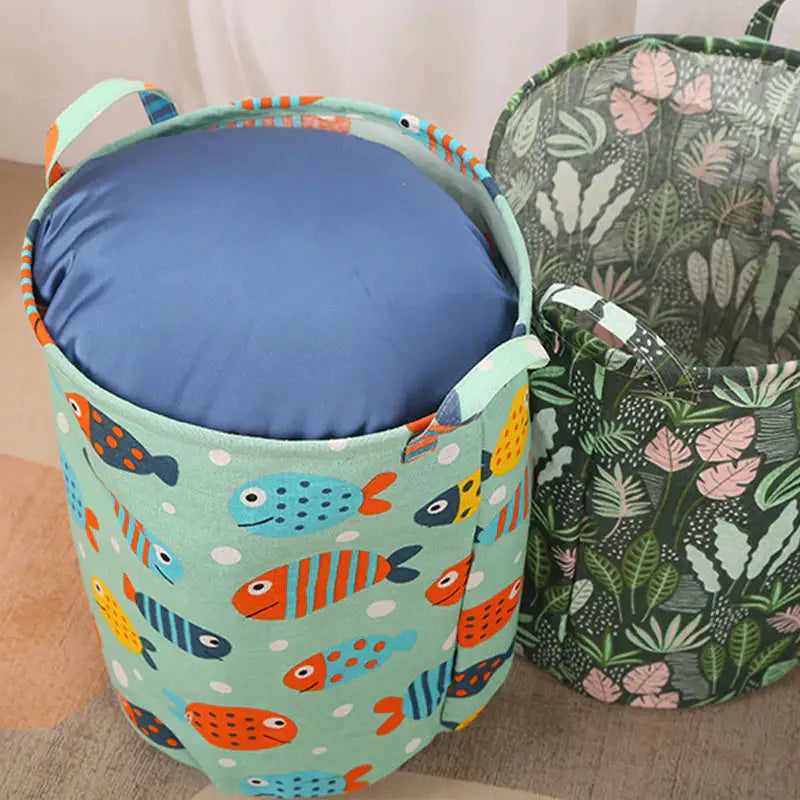 two colorful storage bags sitting on a table