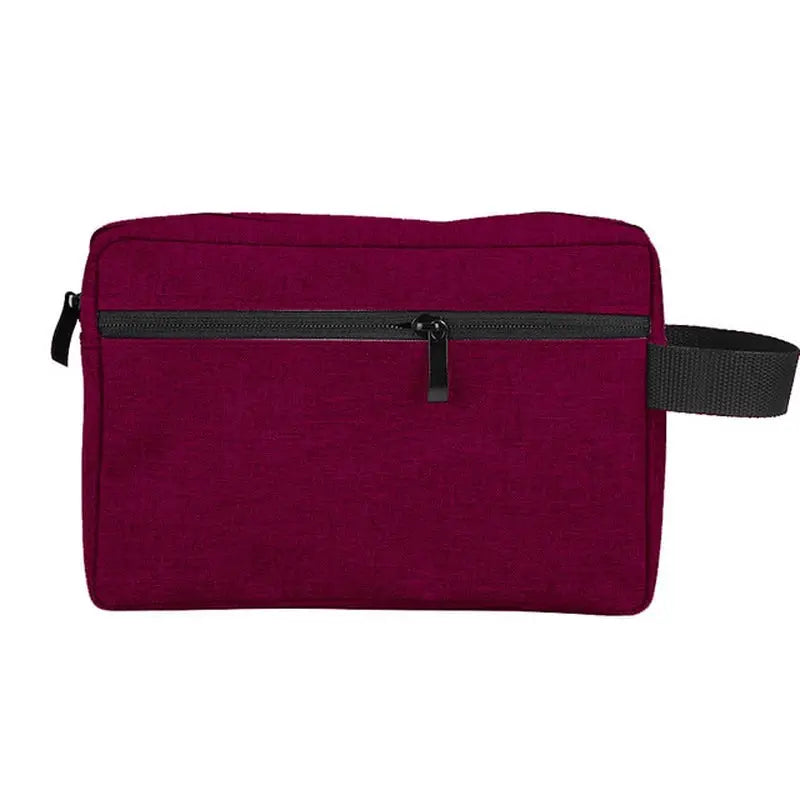 the travel toilet bag in burgundy