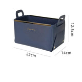 the navy blue leather storage box is shown with the measurements