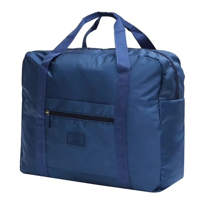 a close up of a blue bag with a zipper on the front