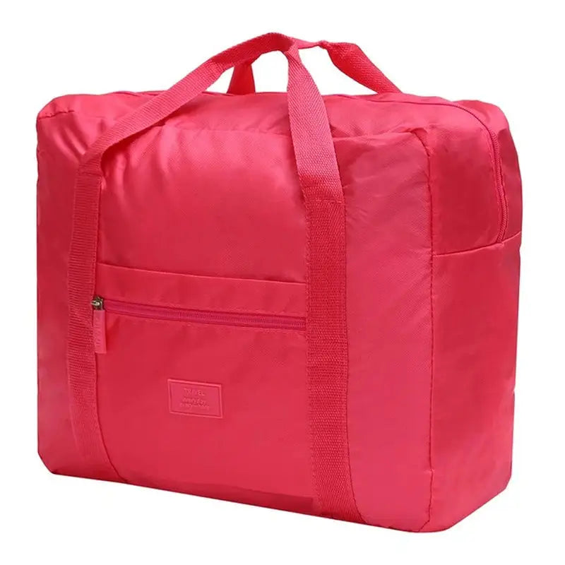 a pink bag with a zipper closure