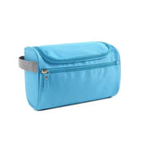 a blue travel toilet bag with a zipper
