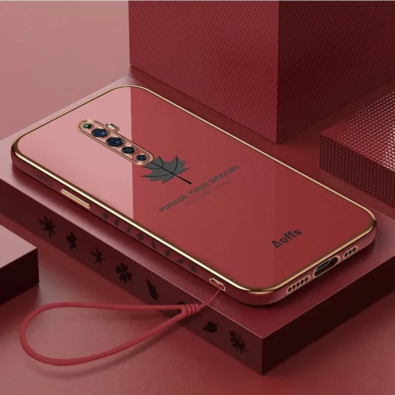 a red case with a gold frame and a red phone