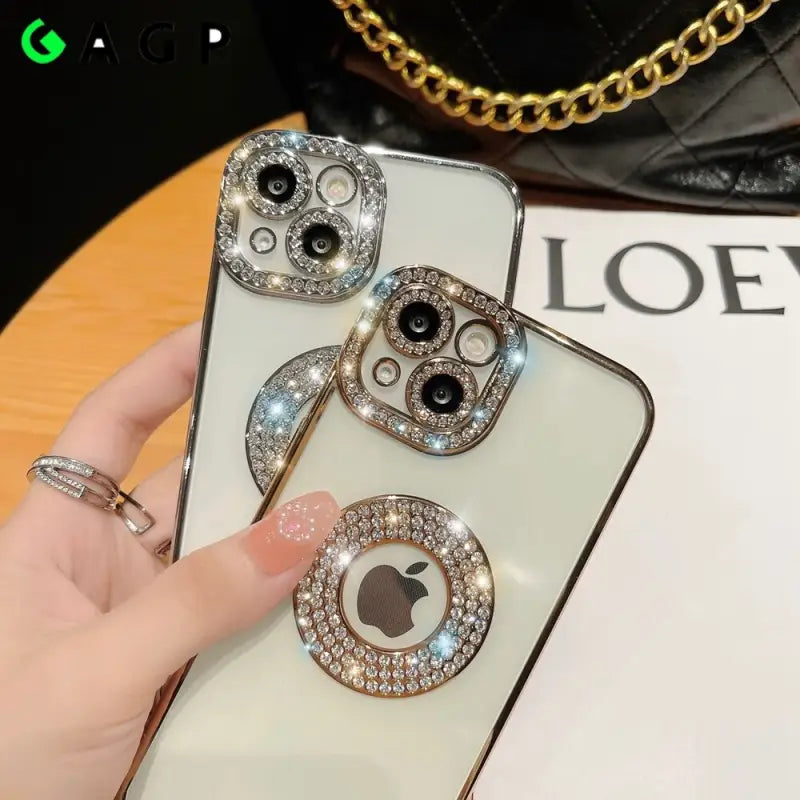 a woman holding a phone case with a diamond eye