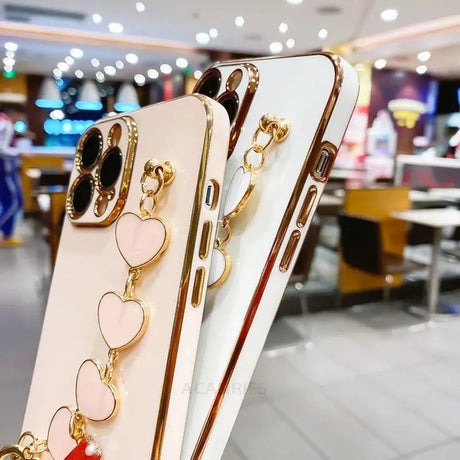 a phone case with a heart shaped phone holder