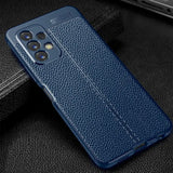 the back of a blue leather case with a leather texture